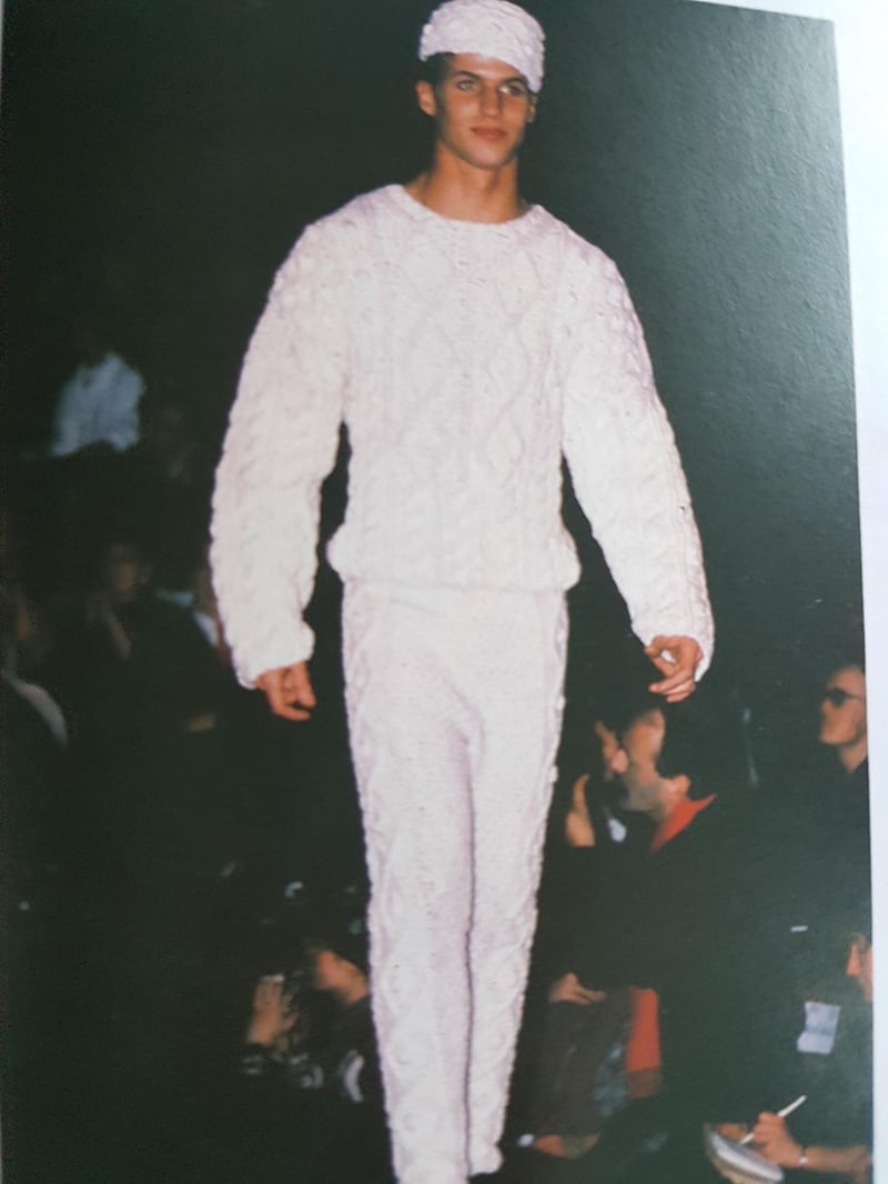 A model in a Jean Paul Gaultier show in 1985 in head to toe Aran knit in snow white wool