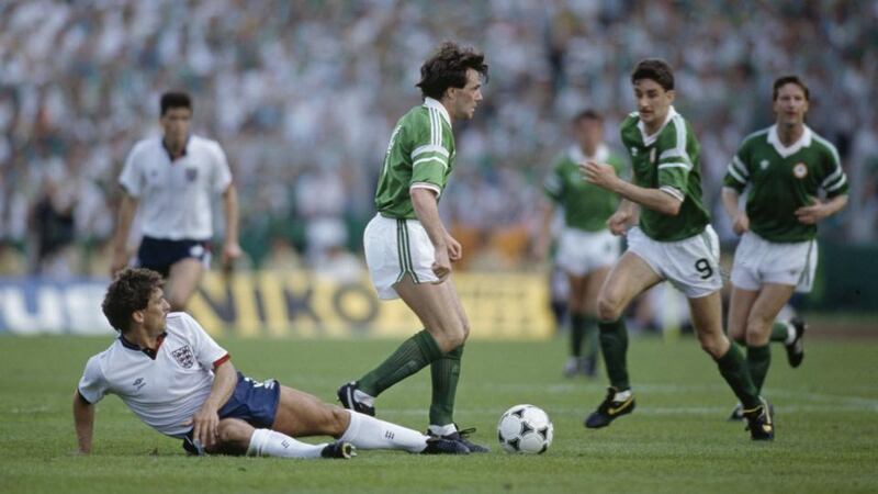 Euro 88: Ray Houghton moves past Kenny Sansom on his way to scoring against England. Photograph: Bob Thomas/Getty Euro 88: Ray Houghton moves past Kenny Sansom on his way to scoring against England. Photograph: Bob Thomas/Getty