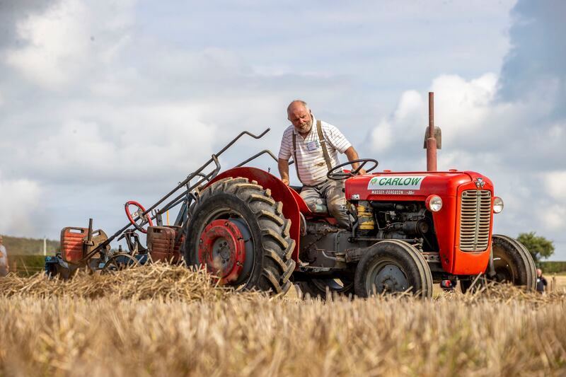 Sean Murphy from  Carlow taking part in Vintage Two Furrow trail at the National Ploughing Championships in Ratheniska, Co. Laois.
Photo: Tom Honan / The Irish Times.