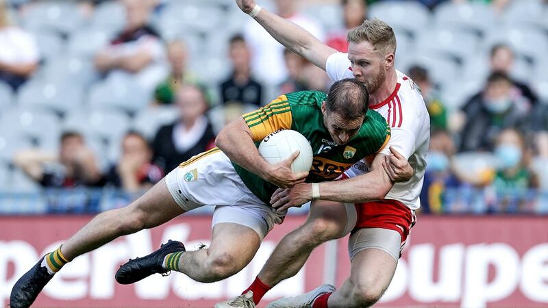 Kerry’s Stephen O’Brien is challenged by Frank Burns of Tyrone during the All-Ireland semi-final. Photograph: Laszlo Geczo/Inpho