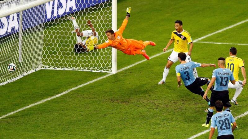 Uruguay’s goalkeeper Fernando Muslera  fails to save a second goal scored by Colombia’s James Rodriguez (10)    at the Maracana Stadium in Rio de Janeiro.  Photograph: Ricardo Moraes / Reuters