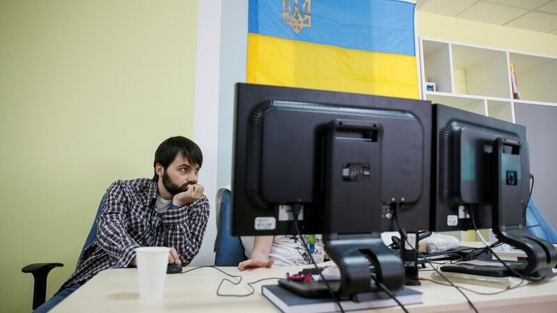 A specialist of IT company Infopulse  in his office in Kiev, Ukraine. Photograph: Reuters/Gleb Garanich