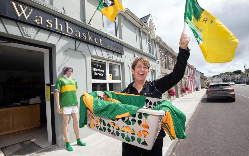 Nora O'Connor outside the Washbasket in Rathmore, Co Kerry, ahead of the All-Ireland final against Dublin on Sunday. Photograph: Don MacMonagle