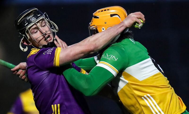 Offaly's Cillian Kiely tackles Corey Byrne-Dunbar of Wexford. Photograph: Leah Scholes/Inpho
