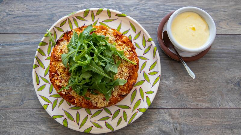 Baked pasta cake with rocket and Parmesan cream. Photograph: Patrick Browne