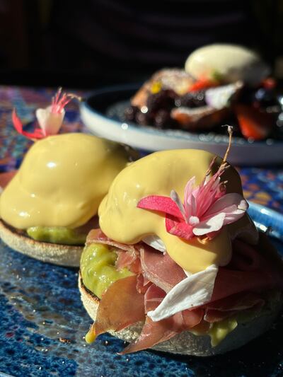 Nyx Hotel Avocado on toast: grilled sourdough bloomer, refried kidney beans guacamole, poached egg and balsamic roast cherry tomatoes, €13.95