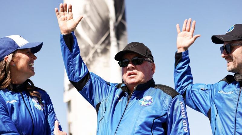 Star Trek actor William Shatner, Blue Origins vice-president Audrey Powers and Planet Labs co-founder Chris Boshuizen after they flew into space, near Van Horn, Texas. Photograph: Mario Tama/Getty Images