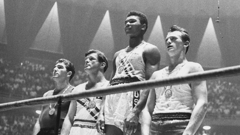 The winners of the 1960 Rome Olympic medals for light heavyweight boxing: Cassius Clay (Muhammad Ali, centre), gold; Zbigniew Pietrzykowski of Poland (right), silver; and Giulio Saraudi (Italy) and Anthony Madigan (Australia), joint bronze. Photograph: Central Press/Getty Images
