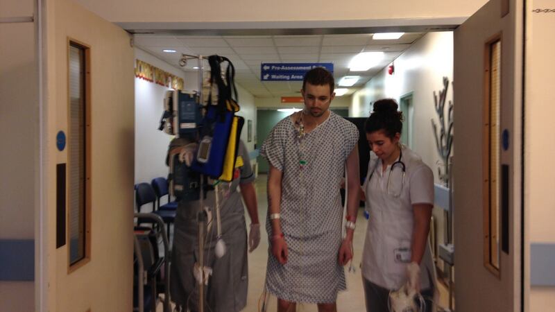 Conor taking his first steps on the morning after major surgery