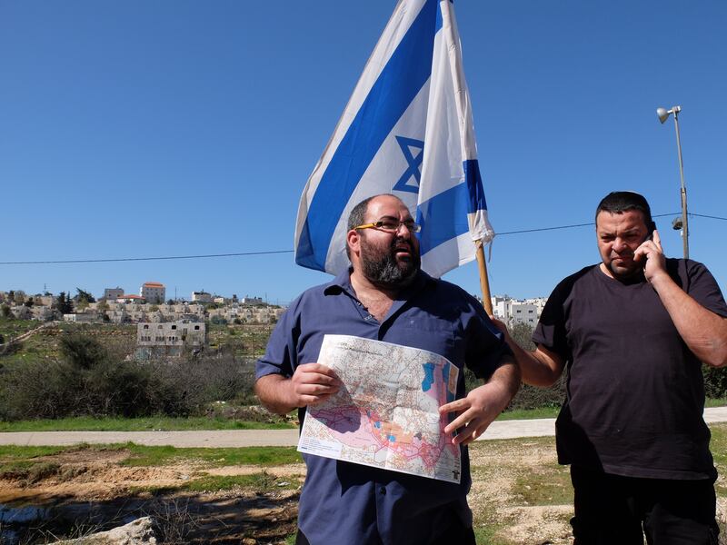 Hebron, at the grave of Baruch Goldstein, Yehuda Shaul from Breaking the Silence describes the massacre perpetrated by Goldstein, against 29 Muslim Palestinians in a mosque in 1994, while being harassed by local settlers. Photograph: Eimear McBride