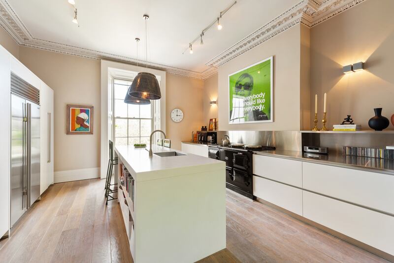 Streamlined kitchen has views to the garden. Photograph: Angela Mujica