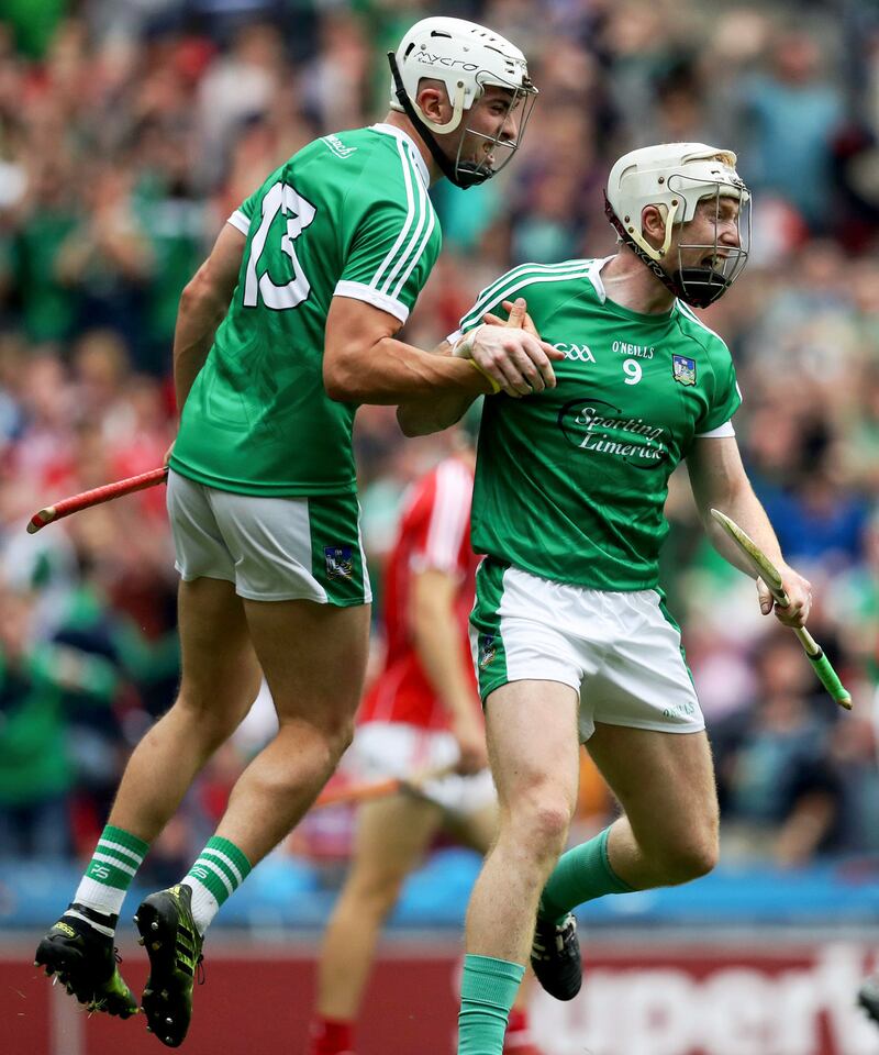 Limerick’s Cian Lynch celebrates scoring a goal with Aaron Gillane on the way to lifting the MacCarthy Cup last summer in Croke Park. File photograph: Tommy Dickson/Inpho