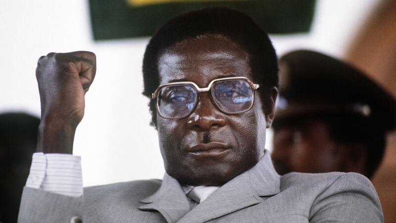 Zimbabwean prime minister Robert Mugabe clenches his fist during a rally in Harare stadium on July 1st, 1984. Photograph: ALEXANDER JOE/AFP/Getty Images