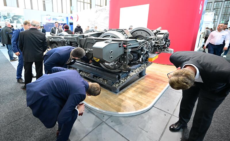 Taking a closer look at an exhibit during the InnoTrans fair last week in Berlin. Photograph: Tobias Schwarz/AFP via Getty Images