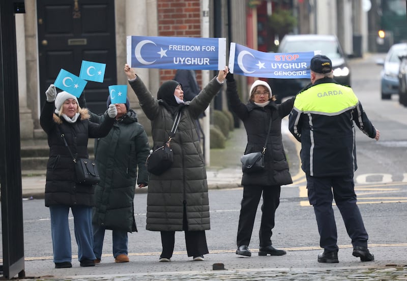 Protesters outside Government Buildings when Taoiseach Micheál Martin met Chinese foreign minister Wang Yi in Dublin. Photograph: Stephen Collins/Collins Photos
