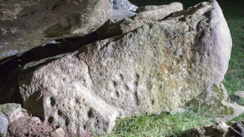 Cloghcor portal tomb rock art: found by Tamlyn McHugh, who was heading up a community project, when she was conducting a video interview with farmer  Leo Leyden. Photograph: Ciaran McHugh