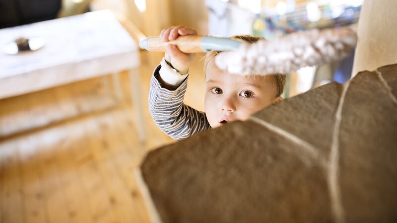 Small children love copying the things they see their parents doing