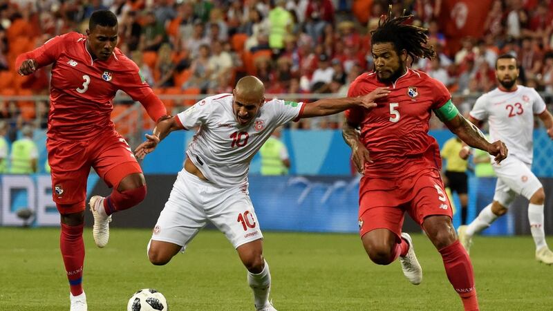 Tunisia’s forward Wahbi Khazri is challenged by Panama’s defender Harold Cummings and Roman Torres. Photograph:   Juan Berreto/AFP/Getty
