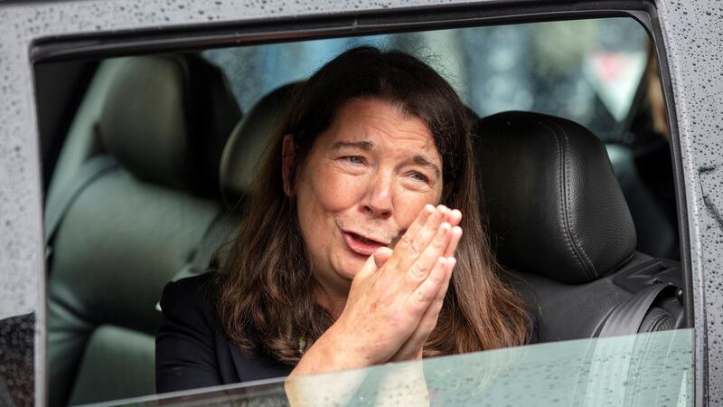 Áine Hume, a daughter of the late John Hume, thanks mourners for their applause as the funeral cortege leaves St Eugene’s Cathedral in Derry Photograph: Paul Faith/AFP via Getty Images