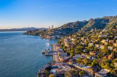 Sausalito, with the Golden Gate Bridge peaking over the hillside.