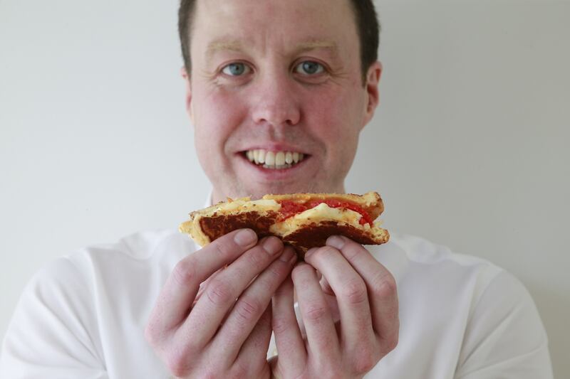 Ciaran Duggan   and his ‘ironed’ toasted Sambo. Photograph: Nick Bradshaw/The Irish Times