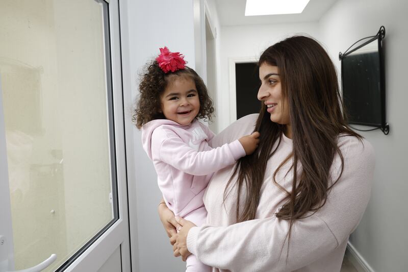 Kamelia Khalfi and her daughter, Zaina (2). Photograph: Nick Bradshaw