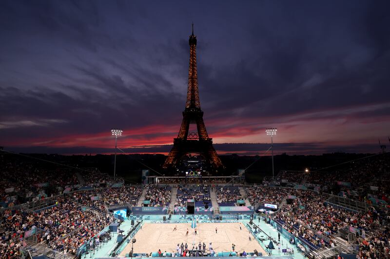 Beach volleyball in the shadow of the Eiffel Tower in Paris during the Olympics. Photograph: Ezra Shaw/Getty Images 