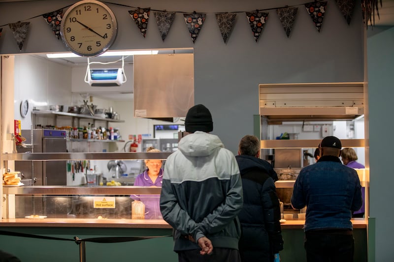 Service users queue for breakfast at the Capuchin Day Centre. Photograph: Tom Honan