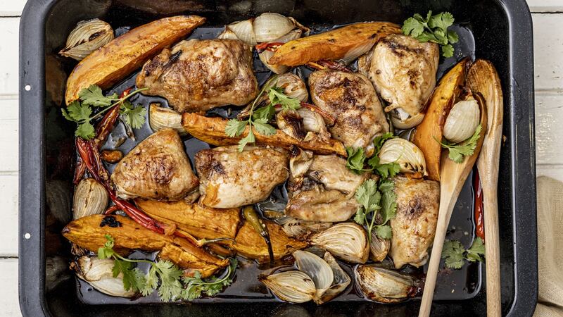 Sticky spice bag chicken tray-bake. Photograph: Harry Weir
