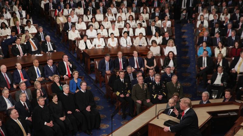 Female politicians dressed in white watch as US president Donald Trump delivers the State of the Union address. Photograph: Alex Wong/Getty Images