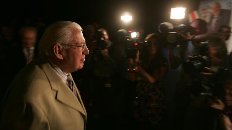 Ian Paisley makes his way to the stage to make his final address to a gathering of DUP members in Belfast to mark his retirement as leader of the DUP in May 2008.  Photograph: Alan Betson/The Irish Times