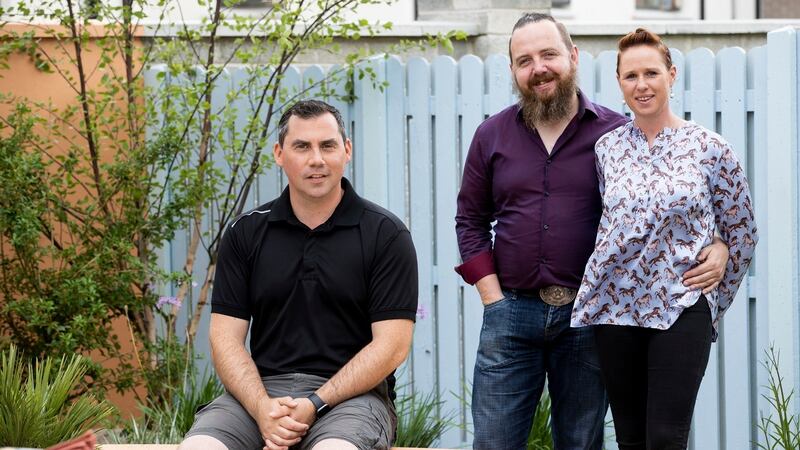 Designer Paul Ferry with homeowners Tom and Catherine Moore in Super Garden