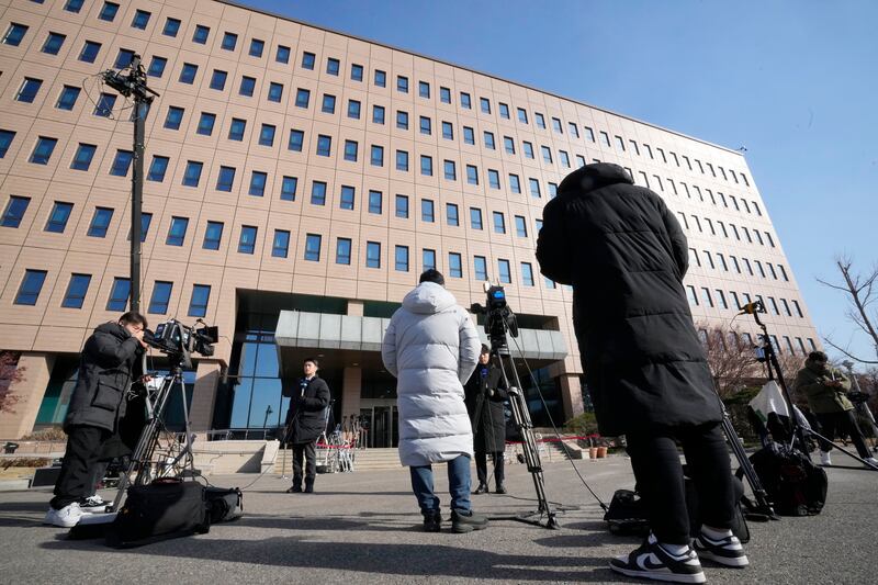 Media members waiting for the arrival of Mr Yoon near the Corruption Investigation Office for High Ranking Officials in Gwacheon. Photograph: Ahn Young-joon/AP