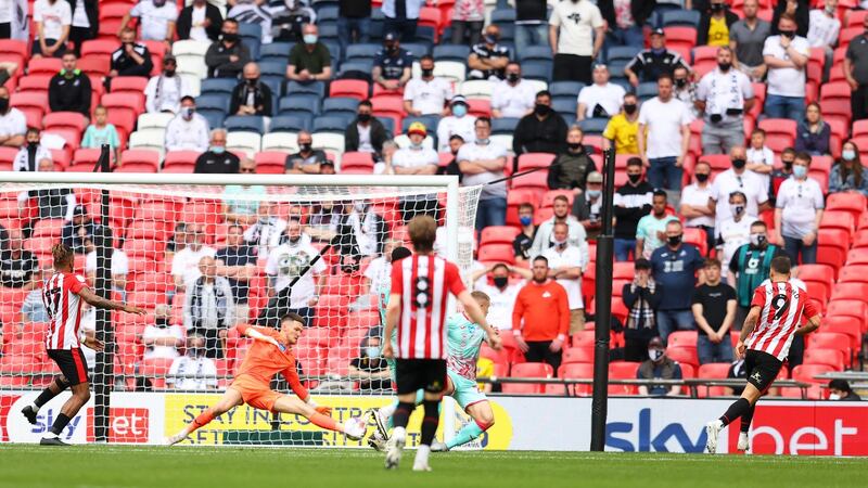 Emiliano Marcondes of Brentford scores his team’s second goal during the Championship Play-off Final win over Swansea. Photo: Catherine Ivill/Getty Images