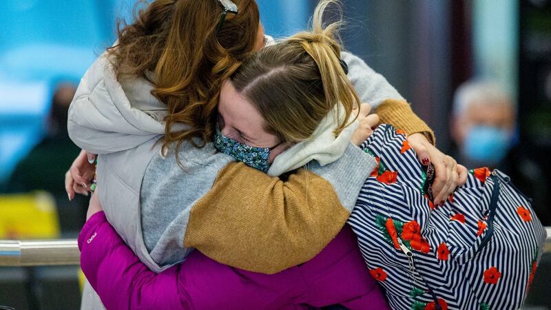 Mother and daughter embrace: June Marron from Dundalk and her daughter Jade who flew back from New York. Photograph: Tom Honan