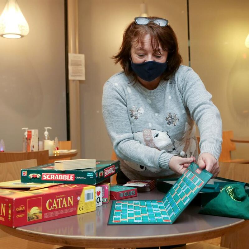 Geraldine O’Connor, Peer Connector, organising games at the Galway Community Cafe. Photograph: Joe O’Shaughnessy
