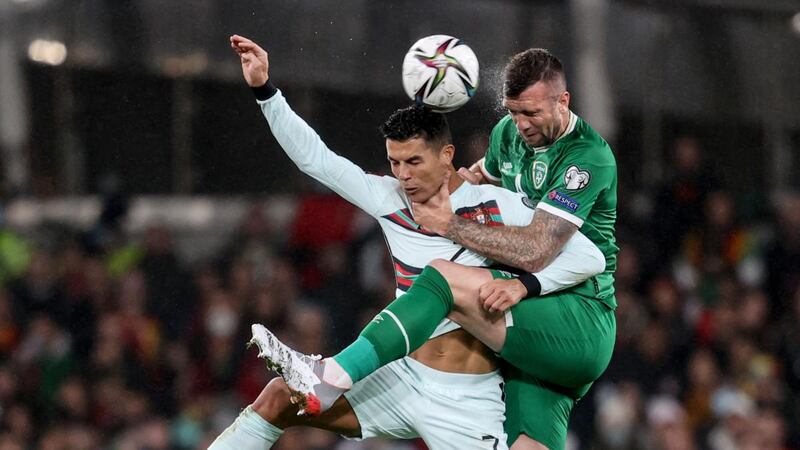 Portugal’s Cristiano Ronaldo and Ireland’s Shane Duffy clash in the air at the World Cup Qualifier match at Aviva Stadium, Dublin on Thursday. Photograph: Dan Sheridan/Inpho