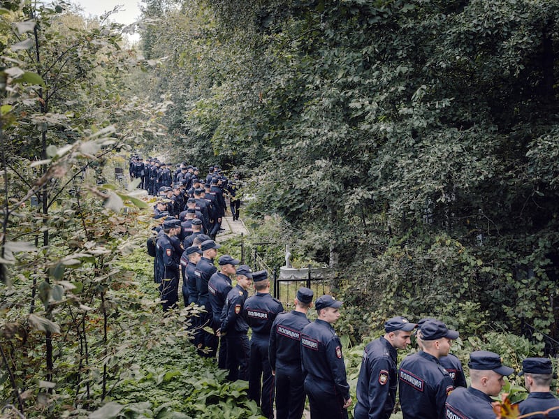Police surround the Porokhovskoye Cemetery in St Petersburg, Russia, where Yevgeny Prigozhin was buried. Photograph: Nanna Heitmann/The New York Times