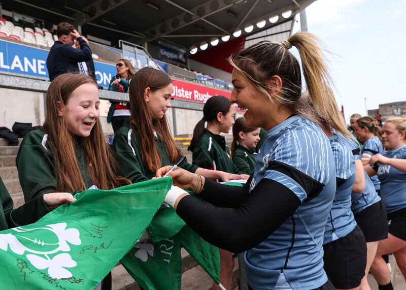 Erin King signs autographs for students from Seaview Primary School and Dundonald Primary School. Photograph: Ben Brady/Inpho
