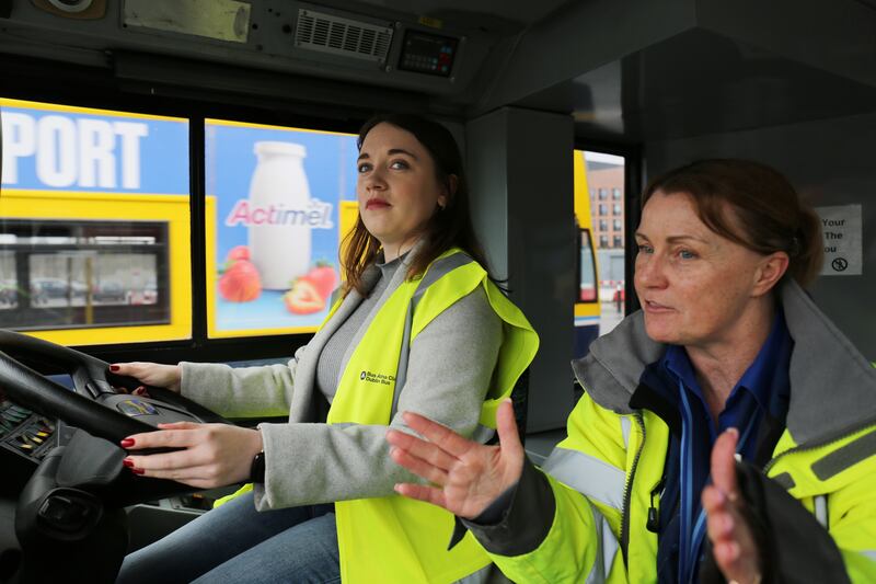 Tina Ahern of Dublin Bus guides Shauna Bowers through a driving lesson. Photograph: Bryan O’Brien 