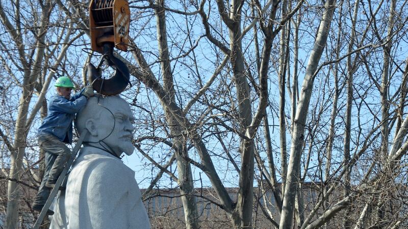 Workers demolish a statue of Soviet statesman Felix Dzerzhinsky under orders to remove Soviet regime symbols by May 21st. Photograph: Maxim Scherbina/Anadolu Agency/Getty