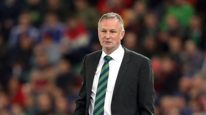 Michael O’Neill, above, is the only international manager Michael Smith has known. Photograph:  Niall Carson/PA Wire