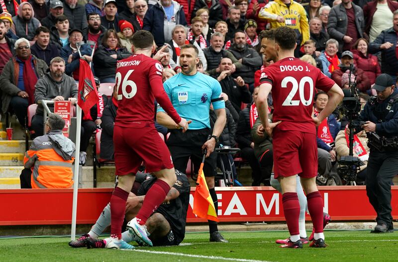 Liverpool's Andrew Robertson appeals to assistant referee Constantine Hatzidakis during the Premier League match at Anfield. Photograph: PA