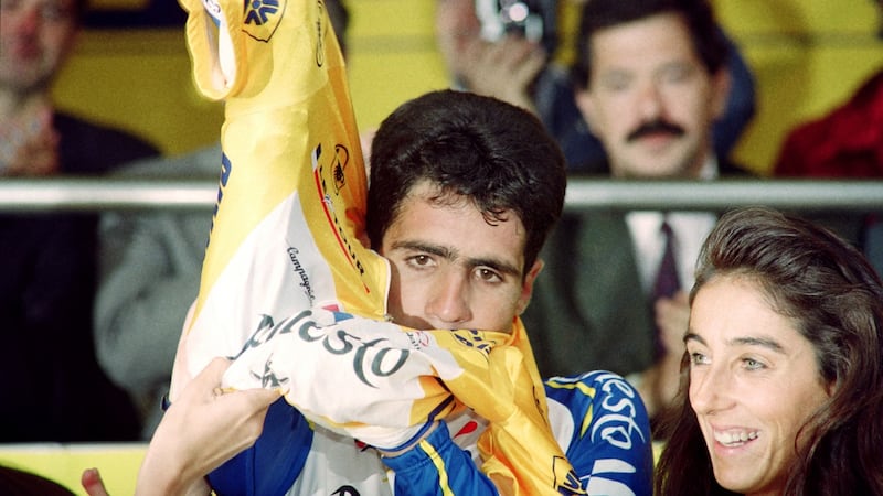 Miguel Indurain puts on the yellow jersey after his win in the Prologue in San Sebastian during  the 1992 Tour de France. Photograph: Boris Horvat/AFP via Getty Images
