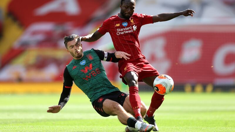 Aston Villa captain Jack Grealish tackles Liverpool’s Naby Keita. Photograph: Carl Recine/PA