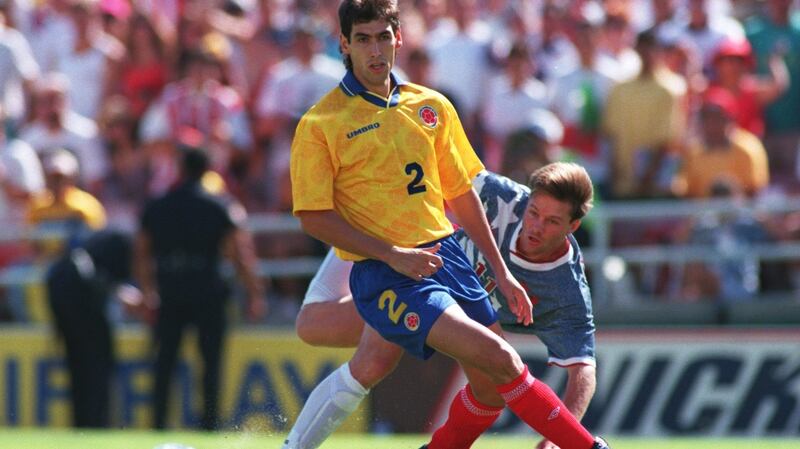 Andrés Escobar holds off the USA’s Eric Wynalda. Photograph: Shaun Botterill/Allsport