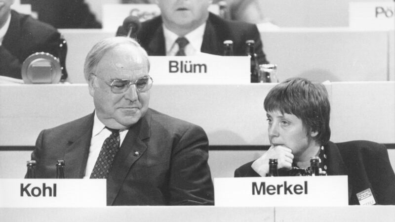 Germany’s then-chancellor Helmut Kohl with Angela Merkel in Bonn in  November 1992. Photograph: Thomas Imo/Photothek via Getty Images