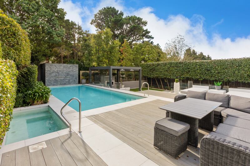 Swimming pool, Jacuzzi and decked seating area. Photograph: Alex Urdaneta