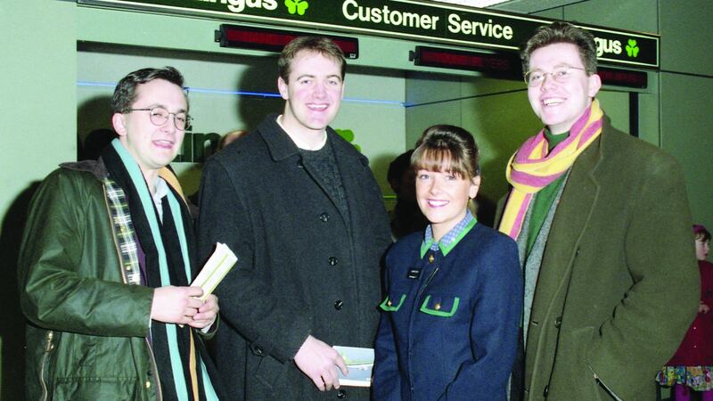 Marcus Dowling, Dara Ó Briain, and Bernard Dunleavy, with Elaine Kelly of Aer Lingus after their victory in The Irish Times debate in 1994. Photograph: Jack McManus/The Irish Times