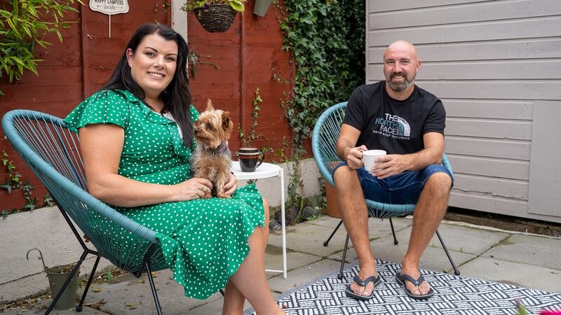 Seen here with family dog Chloe, their long term plan is to buy a camper van and then travel – everywhere!